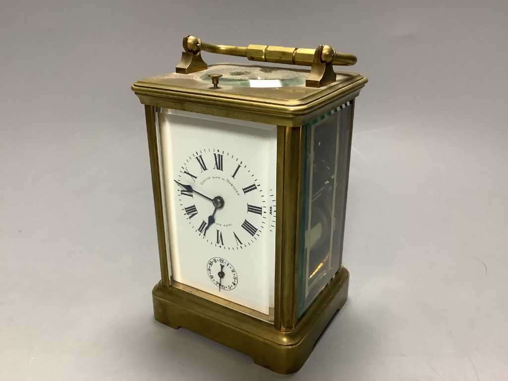 An early 20th century laquered brass repeating carriage clock with alarm, marked apprentice of Breguet, height 12cm